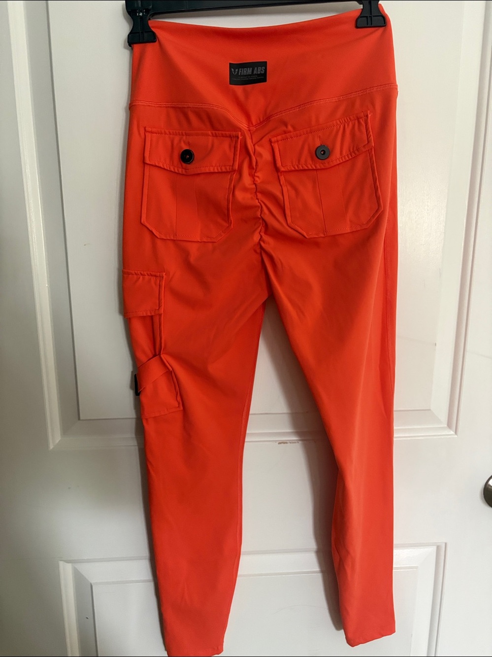 Like new! FirmAbs Orange scrunch butt Cargo Leggings, M